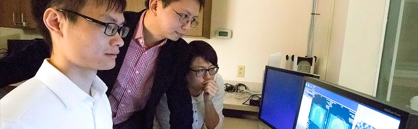Researchers viewing an fMRI scan