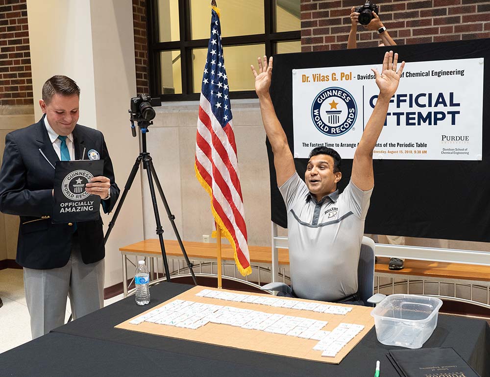 Photo of Professor Vilas G. Pol setting a new Guinness World Record for the fastest time to arrange 118 elements of the periodic table