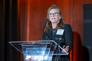 Speaker Alice Johnson shares her personal journey from the podium