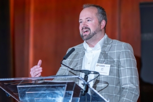 Speaker J.T. Eagan shares remarks from the podium