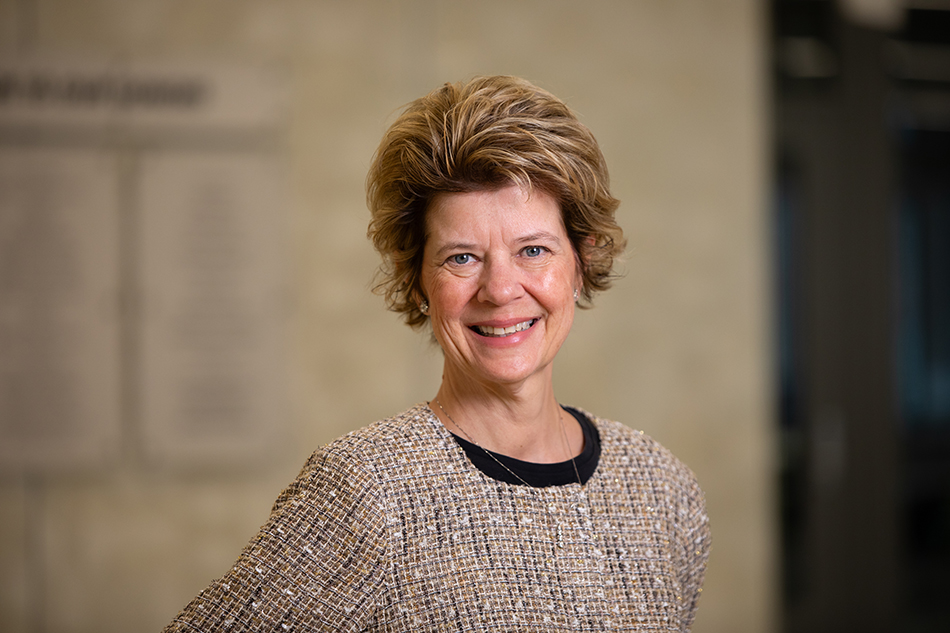 headshot of person smiling at camera