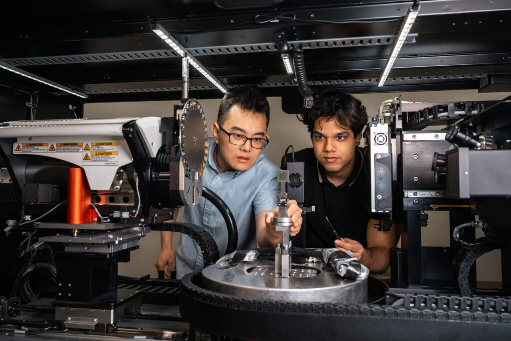 Researchers stare at equipment