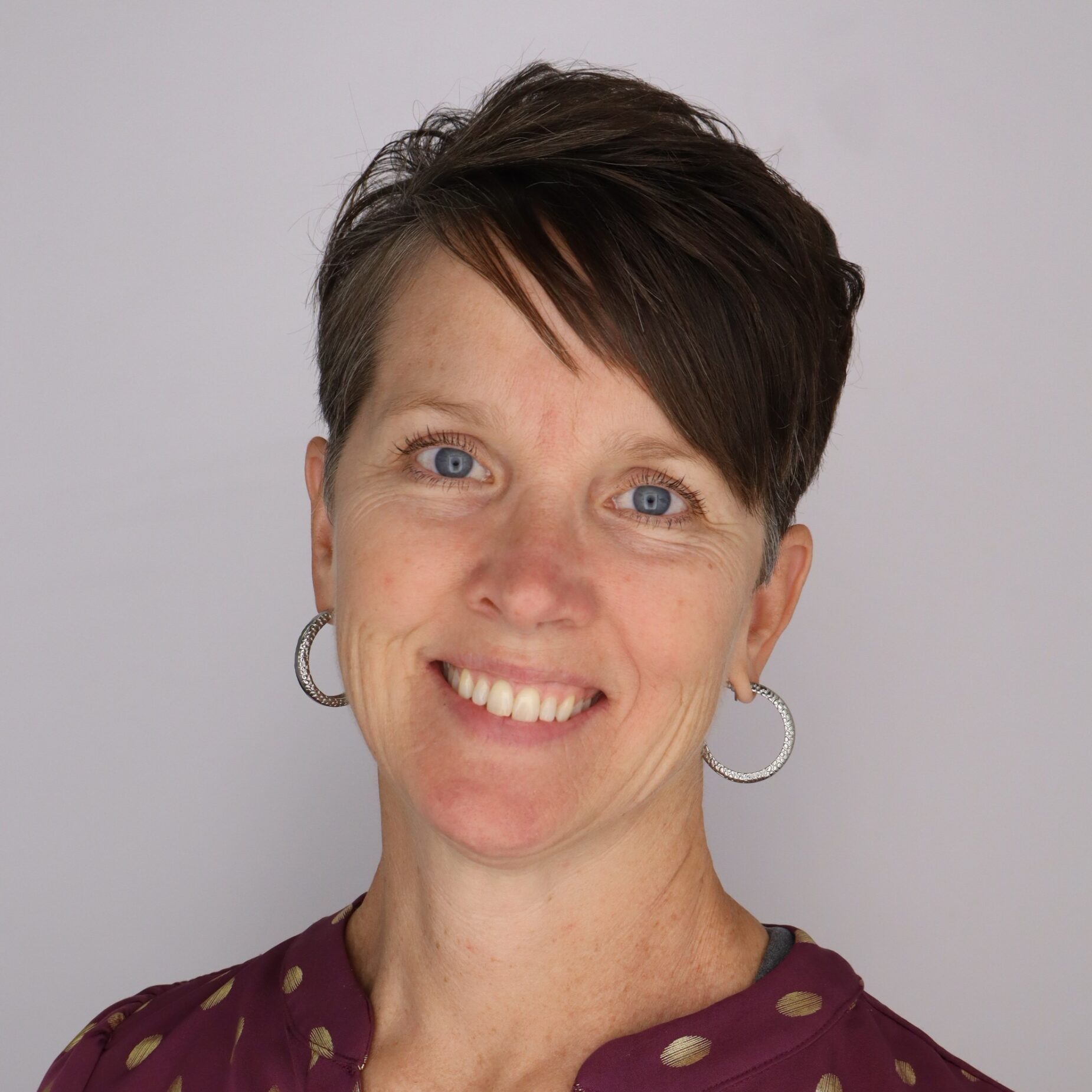 Headshot of Christal Musser, Director of OIGP