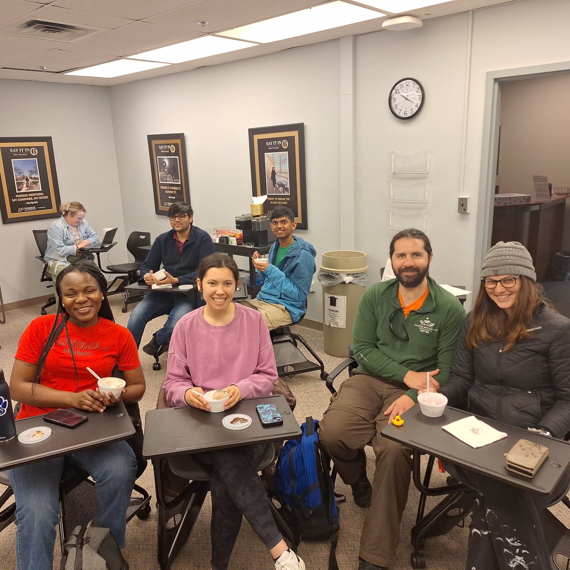 Students at desks with ice cream