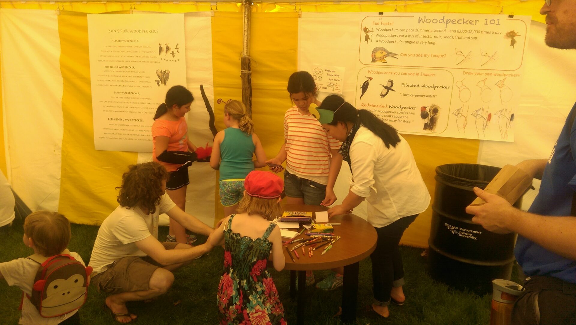 Students helping children
