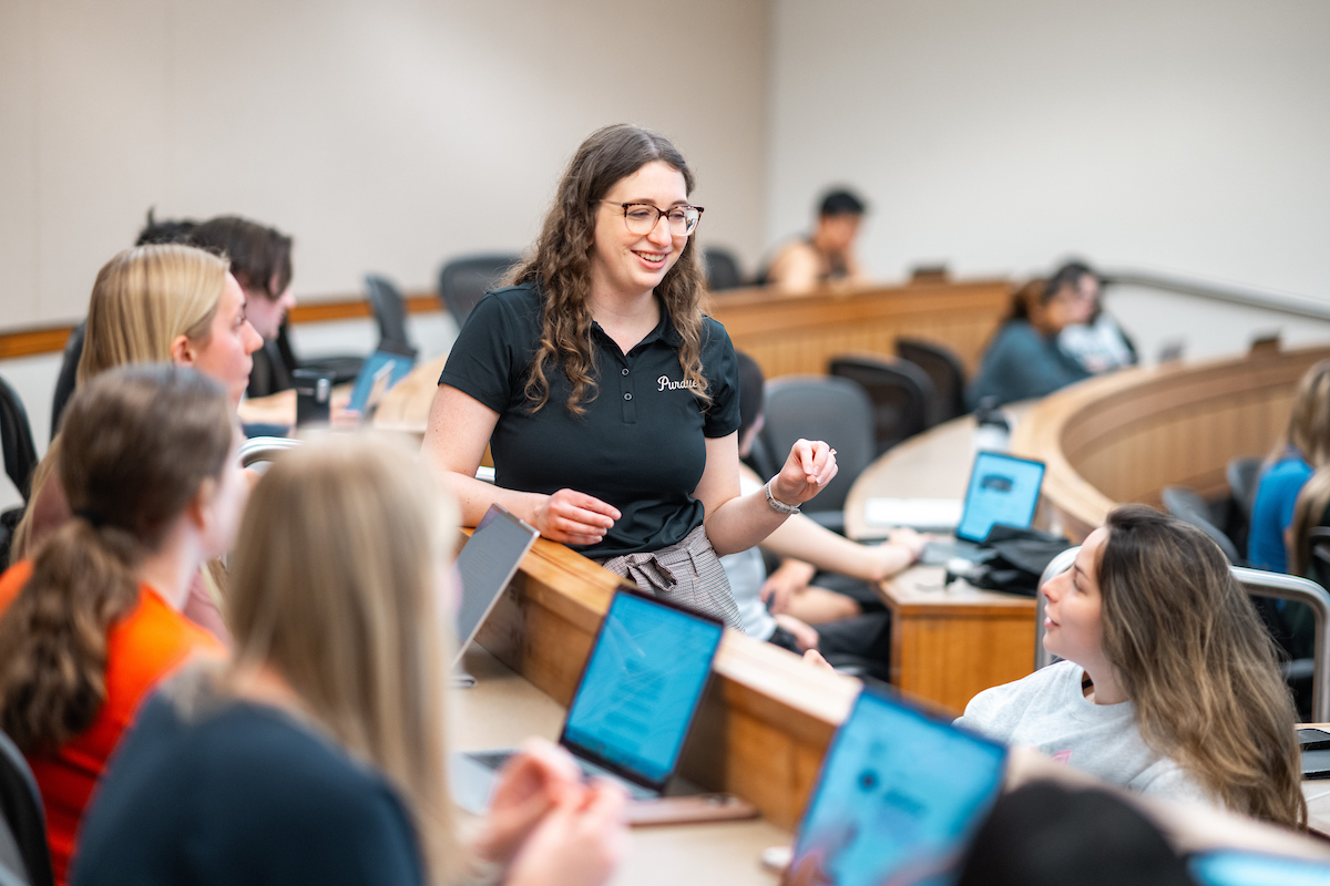 Instructor leading a class of students