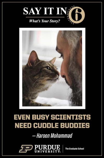 Man nose to nose with his cat with the caption, "even busy scientists need cuddle buddies."