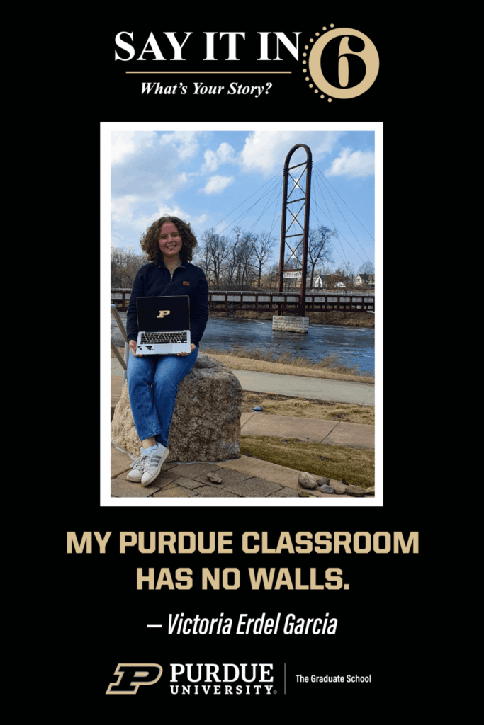 Woman with a laptop computer sitting on a rock in front of a river with a bridge in the background. The caption reads, "My Purdue classroom has no walls."