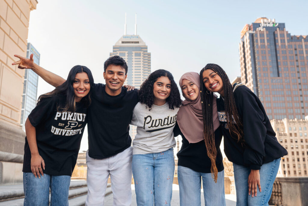 Students outside huddled together