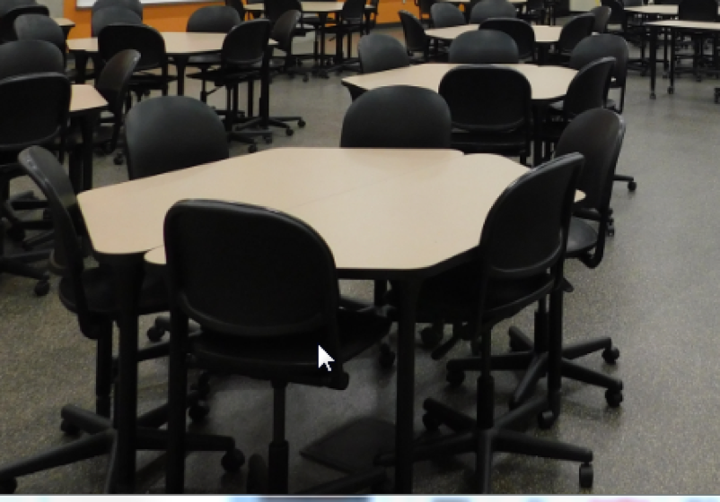 6Round Classrooms  The 6Round model supports 6-person discussion groups seated at either: -- Built-in 60” round tables -- Loose pairs of trapezoidal tables (ganged into a hexagon) These classrooms will have dual projected images at both ends. Floor boxes or convenience outlets at the tabletops will be provided.  