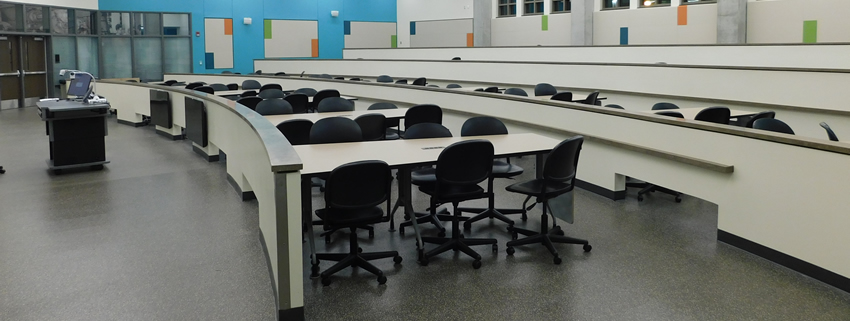 Boiler Up Classrooms. In these fan-shaped classrooms, students will work at 6-person wedge-shaped tables with power at the tabletop. Triple projection screens will assure every student an excellent view of dual projected images. All tables have personal portable whiteboards and comfortable swivel task chairs.