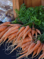The farmers market gathers together local vendors who offer various items, including fresh produce, hot food and tasty desserts. 