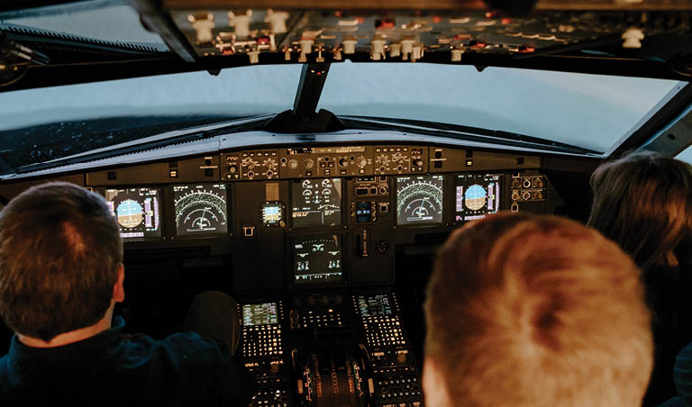 Students in cockpit.
