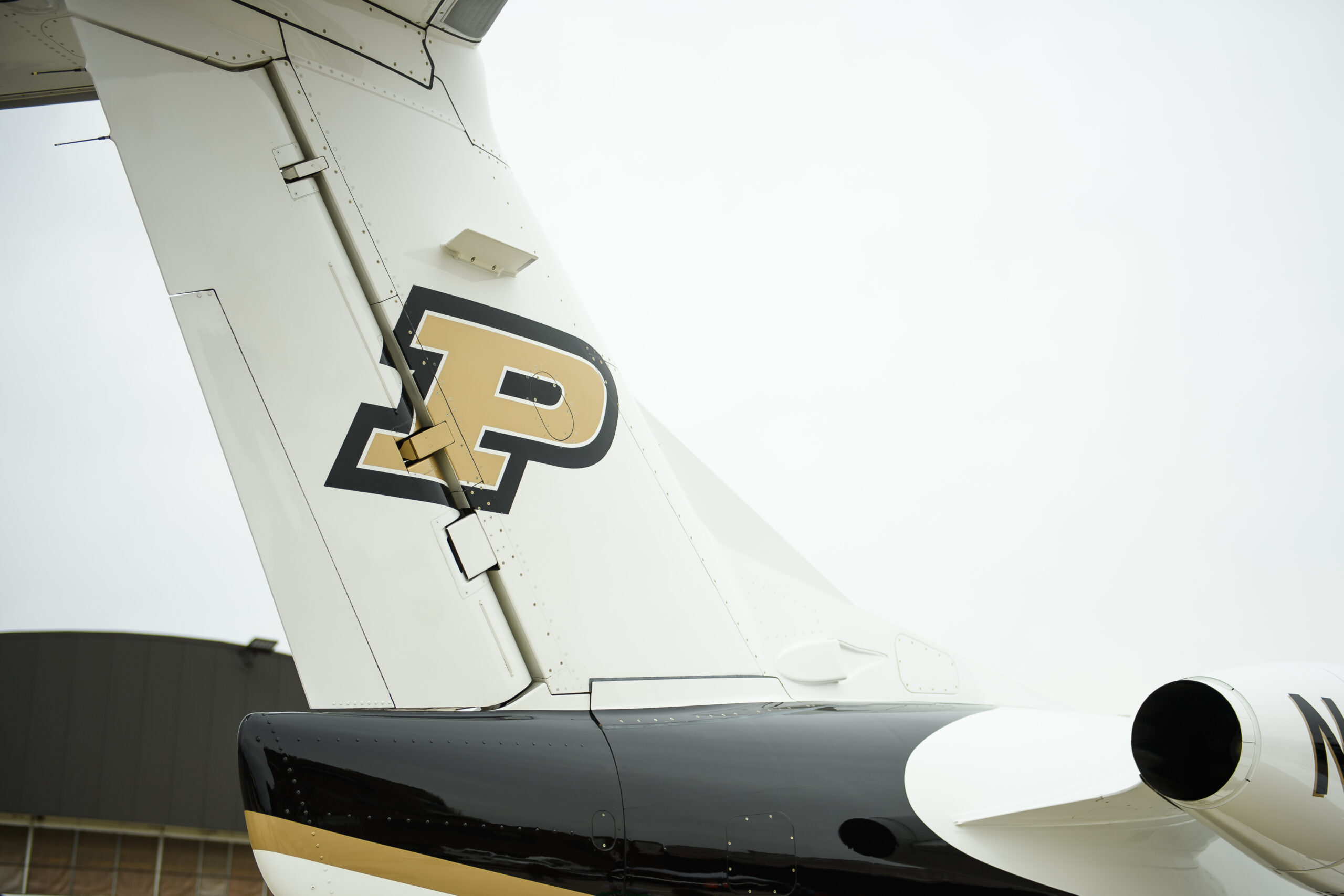 Purdue University motion P logo on airplane tail.