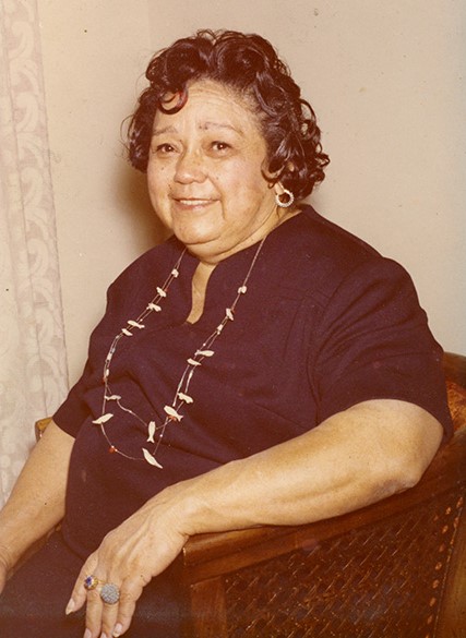 photo of helen bass williams looking at the camera, sepia colored