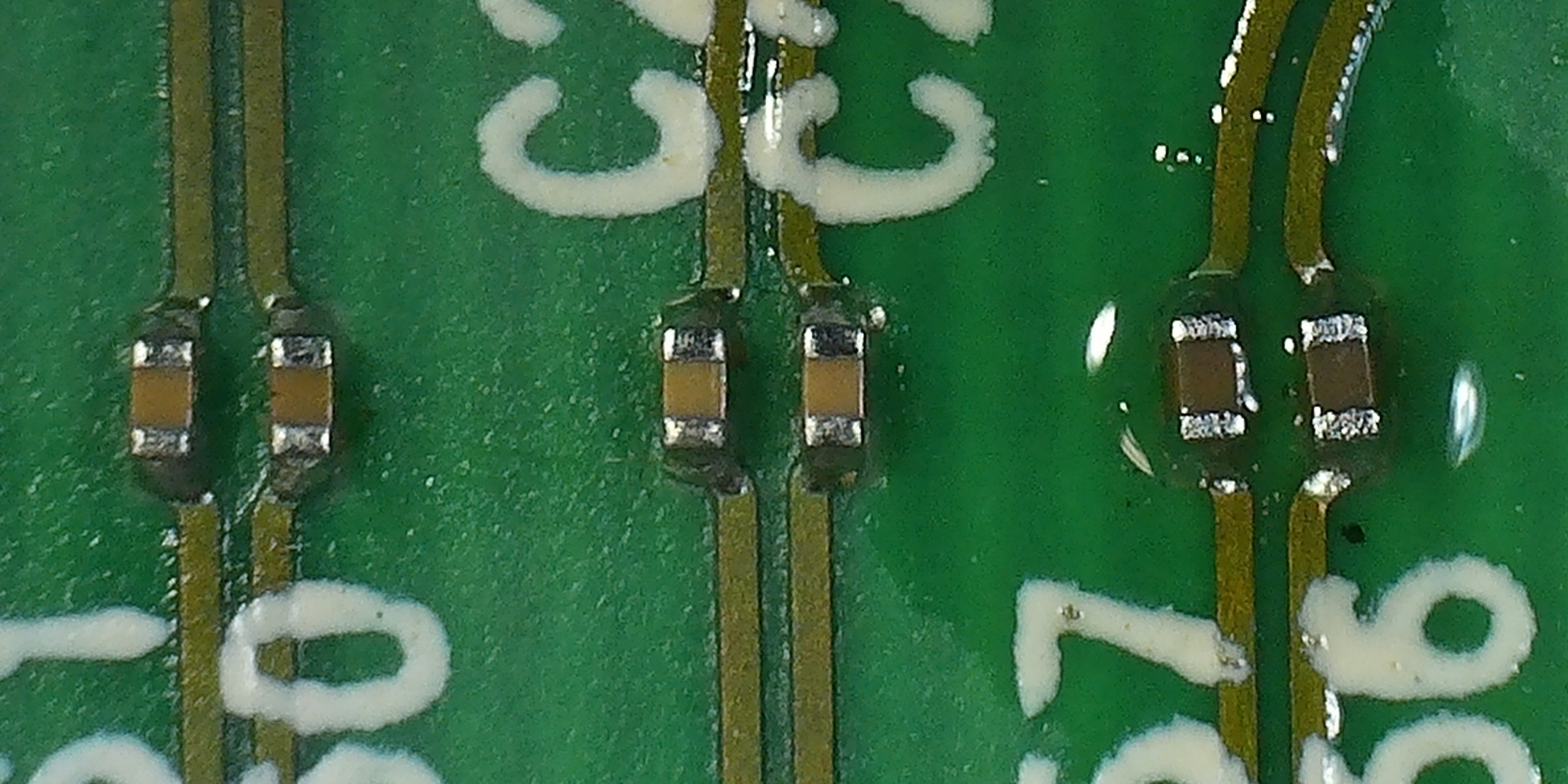 PCB with Differential Pairs showing SMT DC Decoupling Capacitors