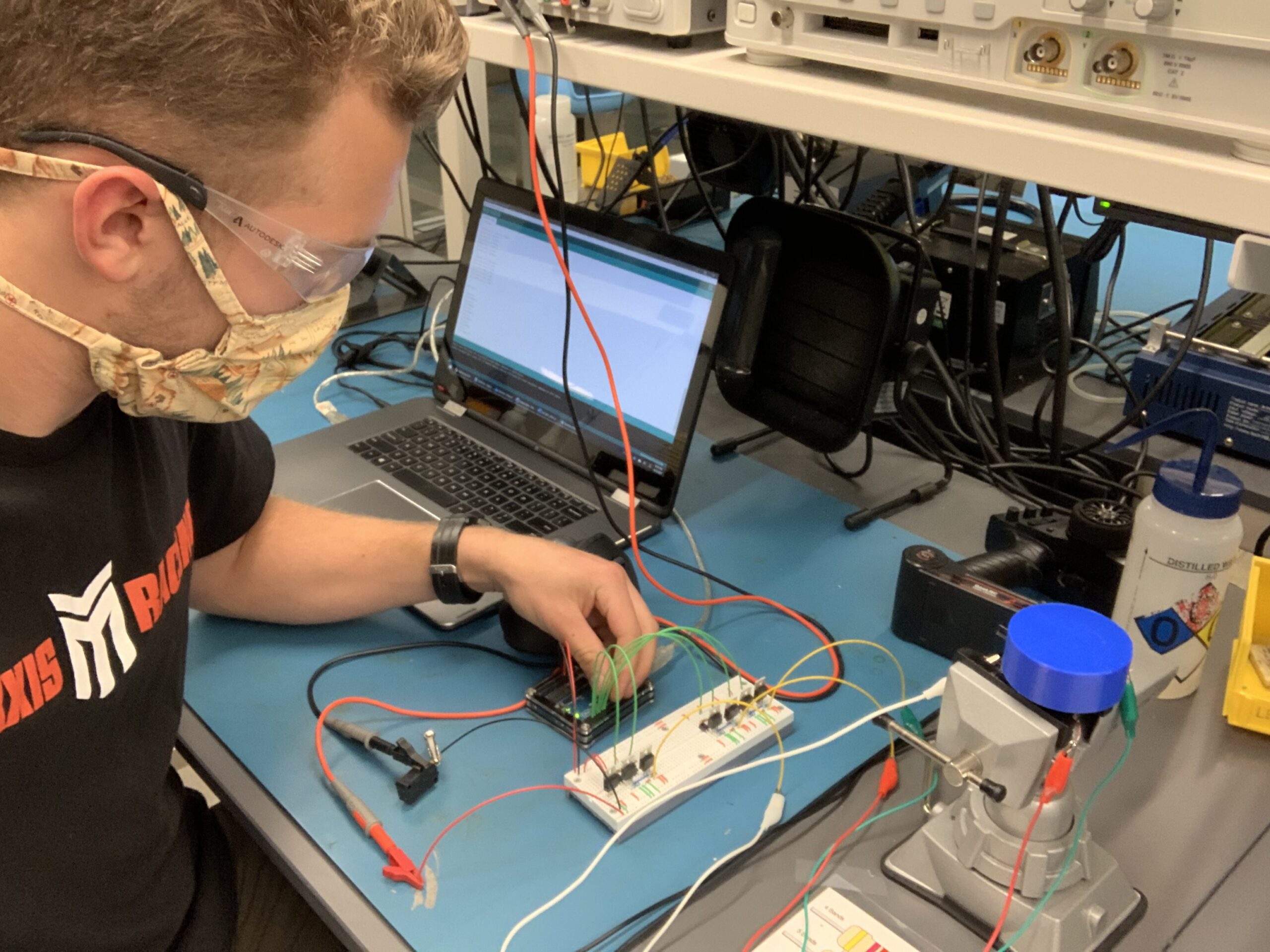 Luke prototyping the controller for his custom brushless DC motor in the Electronics Lab