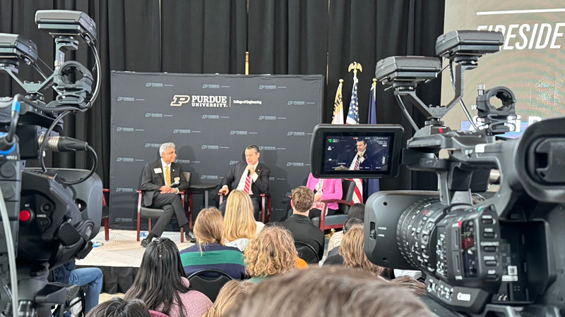 Video production equipment broadcasting live conference event.