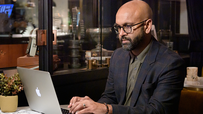 Staff member on laptop