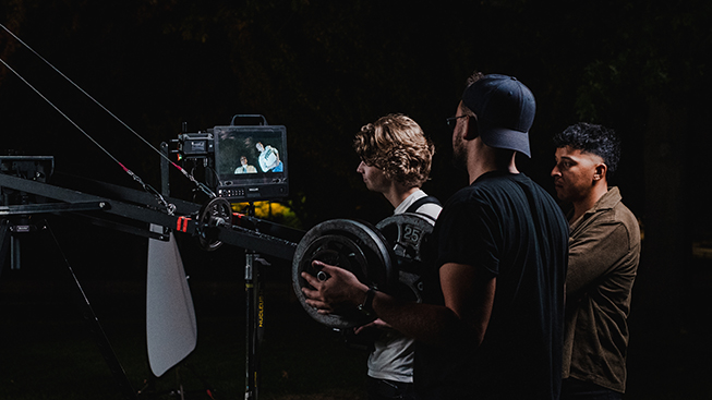 A behind-the-scenes image of a video production shoot