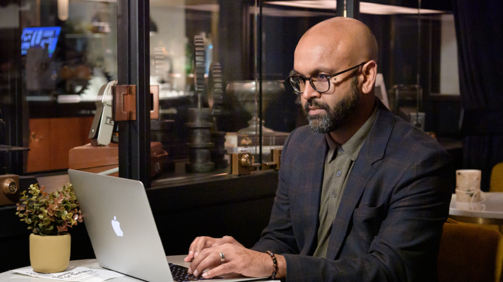 Staff member on laptop