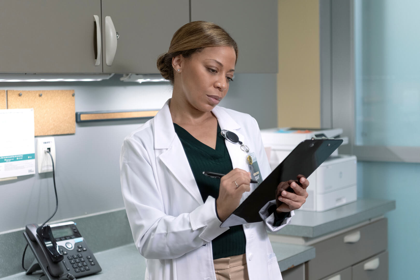Student with clipboard.