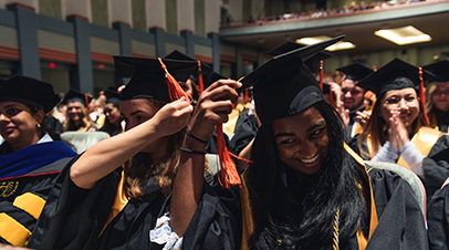 Graduates turning their tassels during commencement