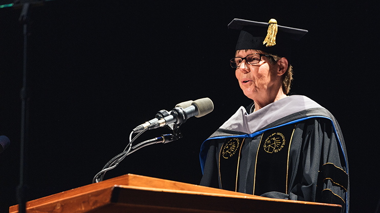 Dr. Deborah Knapp addresses candidates at commencement.