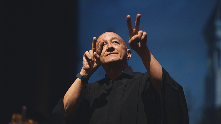 An ASL interpreter providing access for a graduation ceremony