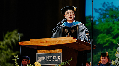 Purdue President Mung Chiang addresses graduates during commencement