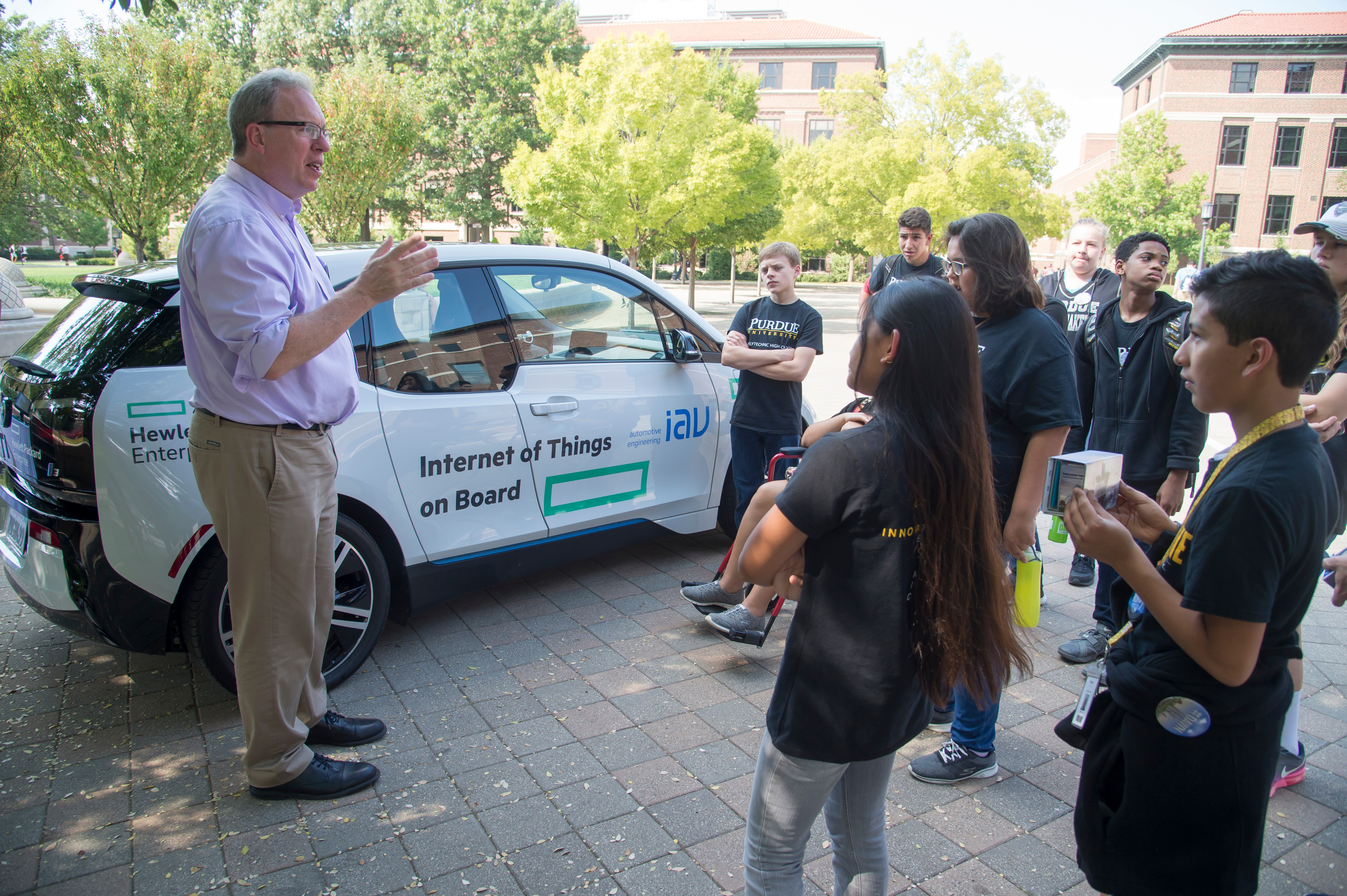 Students from Purdue Polytechnic High School in Indianapolis visit the HPE Connected Car while attending the 2017 conference.