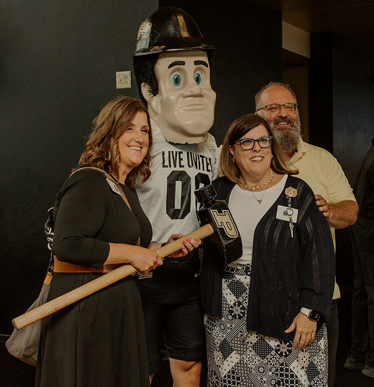 Members of the Purdue community pose with Purdue Pete at a Purdue United Way event