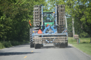 Tractor and tillage equipment on roadway