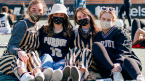 Female Students Outside in Masks