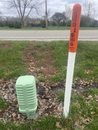 Runoff from roads surfaces into trenches can quickly form gullies from soil erosion if not quickly repaired following utility work.