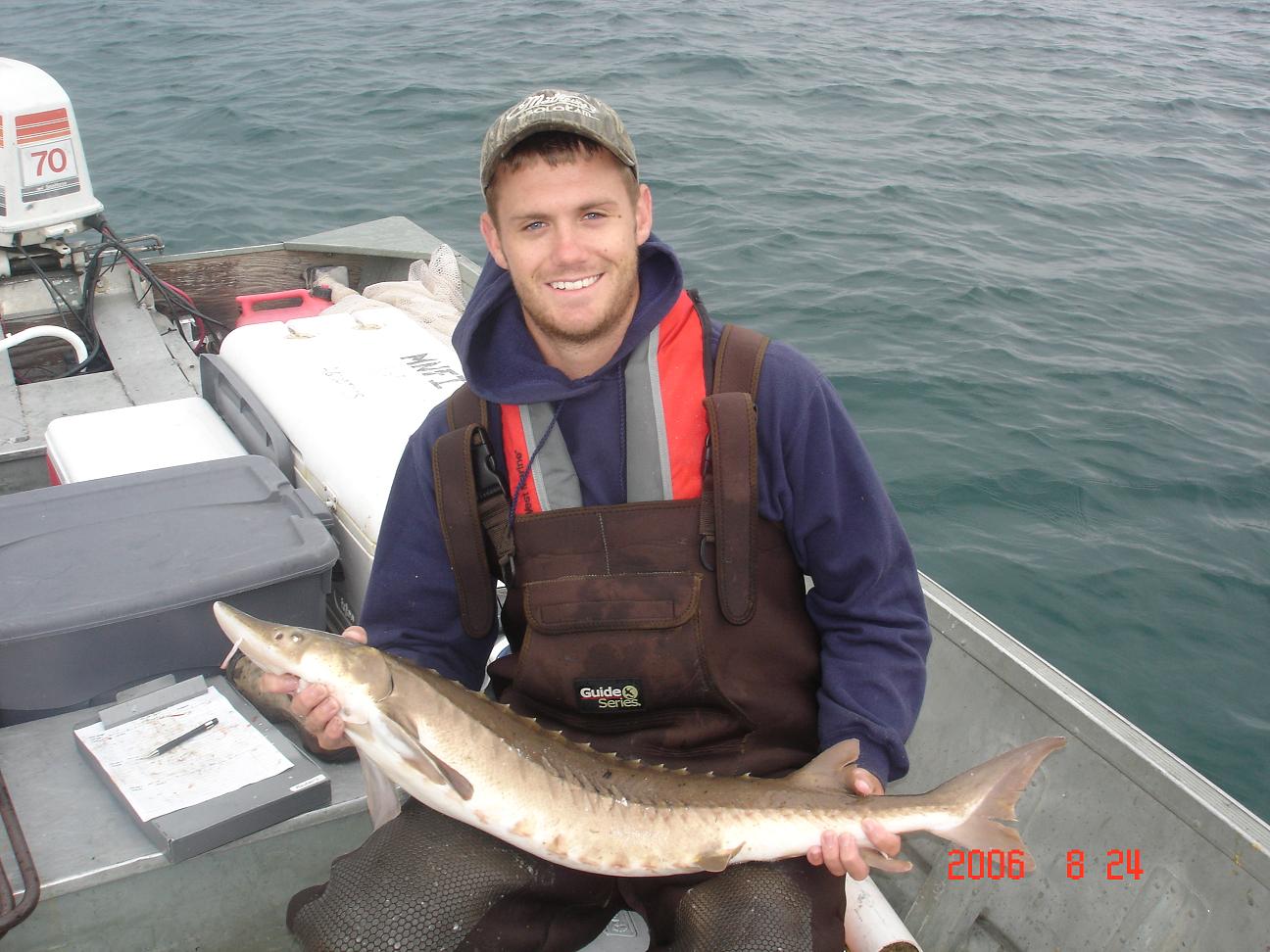 Brandon Sturgeon holding a fish