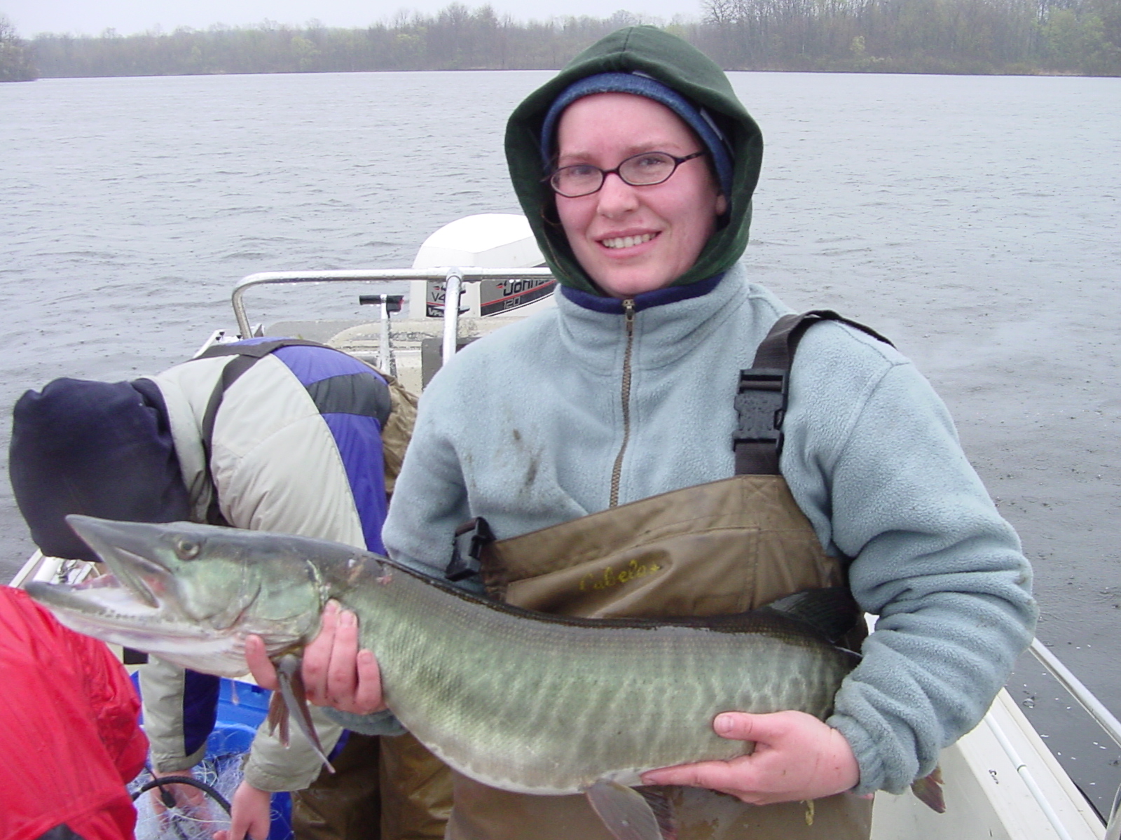 Team member holding a fish