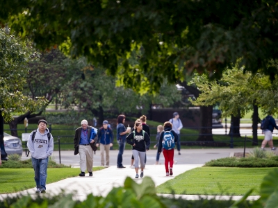 People walking around campus