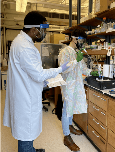 Isaiah Mensah working in a lab