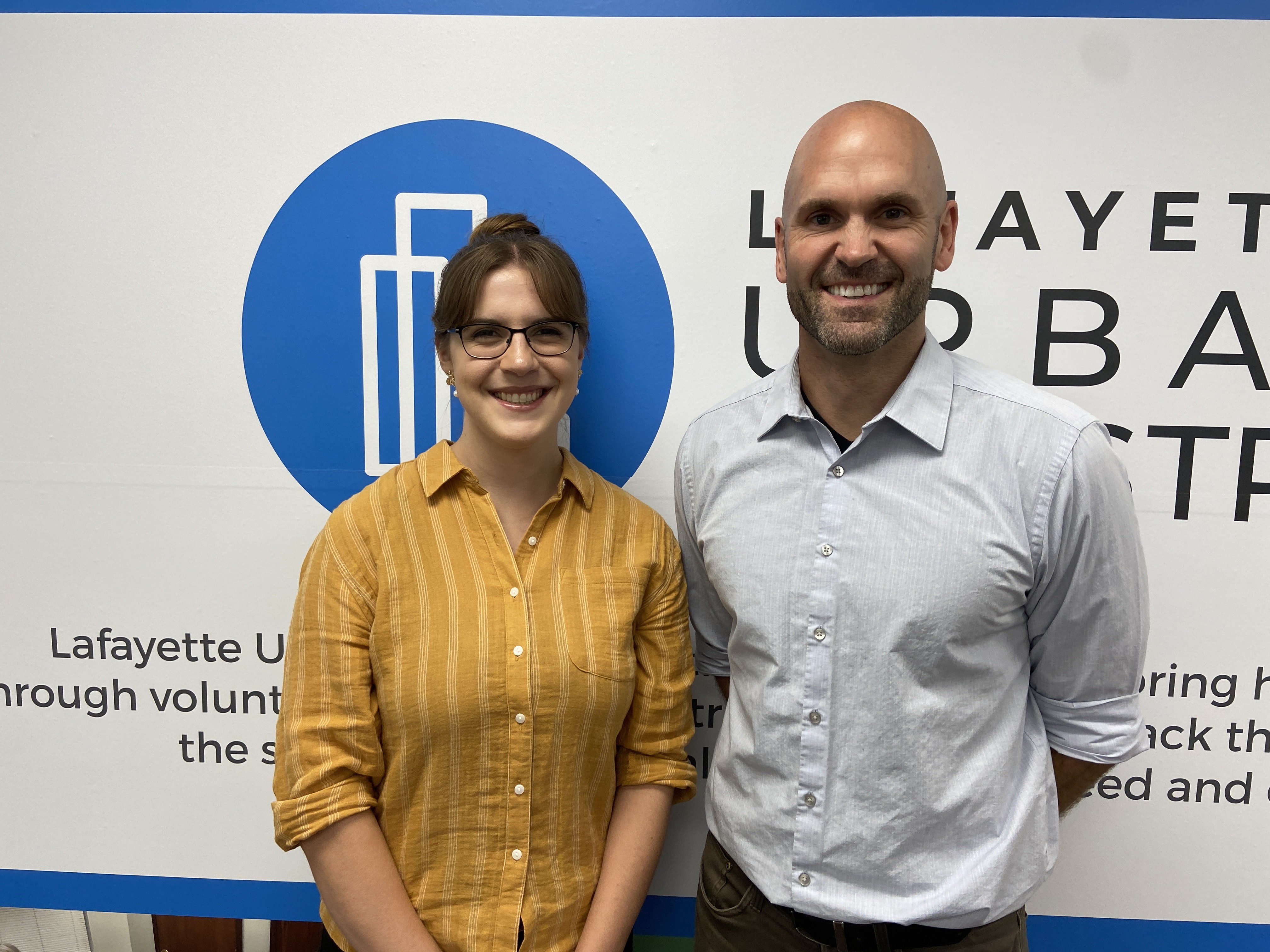 PhD student, Andrea Ens (left) poses with Lafayette Urban Ministry Executive Director, Wes Tillet (right)
