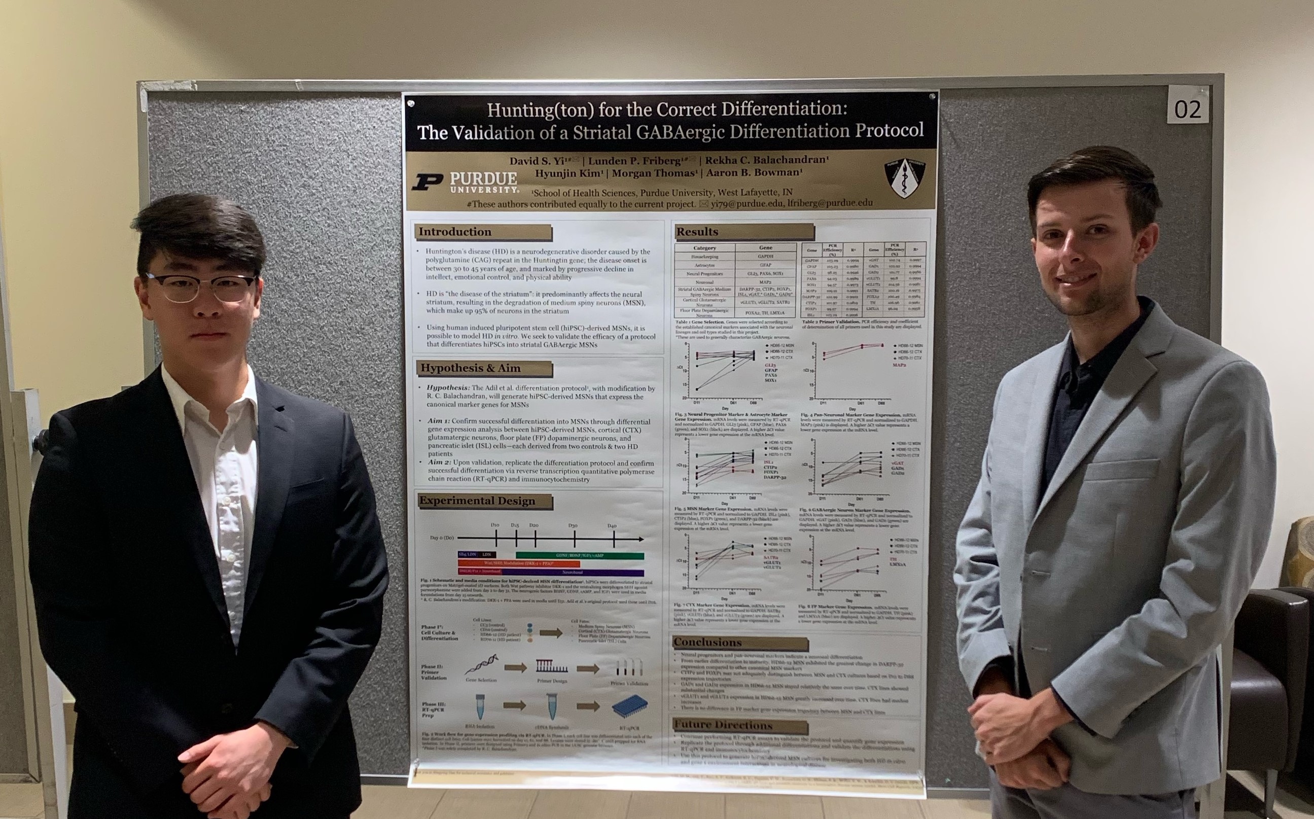 Photo of David Yi and Lunden Frieberg with the poster they presented.