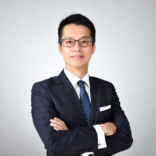 Two millennial women female friends sitting outdoors eating takeaway food, laughing and having fun. Food delivery and takeout.