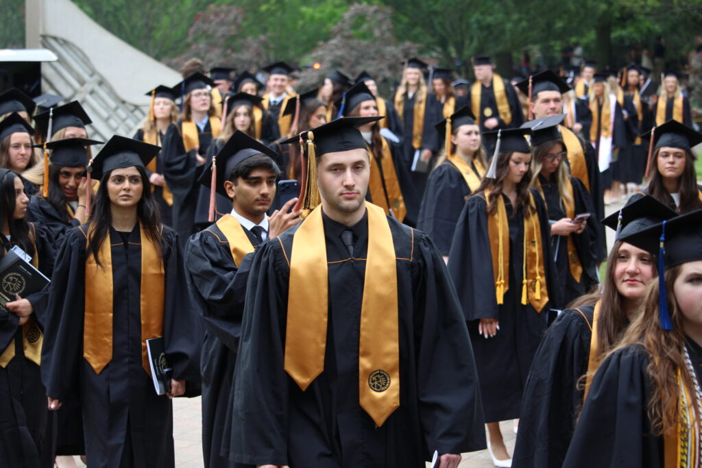 Scenes from Purdue HTM commencement and reception featuring graduates from undergraduate, master’s, and PhD programs.