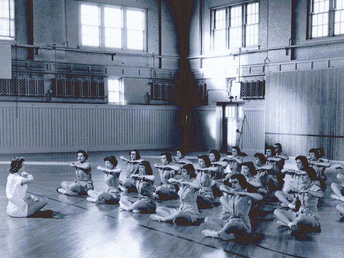 Purdue women in gym class work on posture
