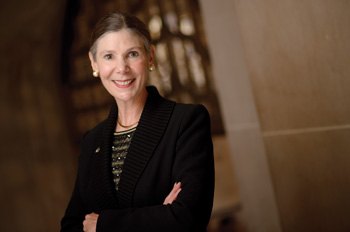 Purdue Football player B.J. Knauf, wide receiver, puts participants through their paces with a bag relay race.