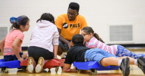 PALS participants learn about upper body strength during a session on SHARBADE boards (SHoulders AR BAck DEvelopment). (Purdue University photo)