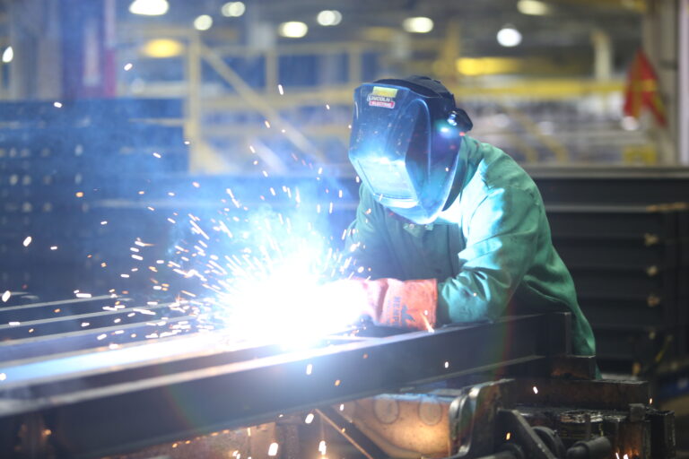 A welder works in a Wabash National manufacturing facility.