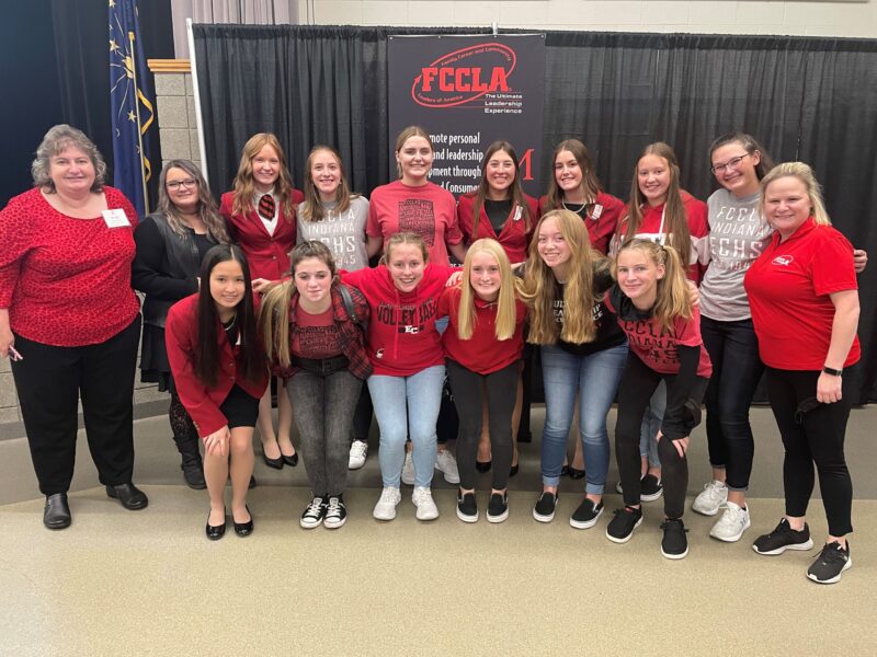 Osman poses with FCCLA students