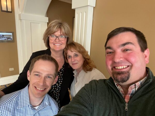Brant Patz takes a selfie with Pam Karagory, Dean Marion Underwood and Chief Development Officer Aaron Kosdrosky.