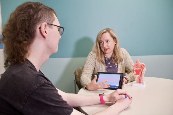 Professor Lydia Kruse meets with client Keita Wade in the Purdue Center for Voice